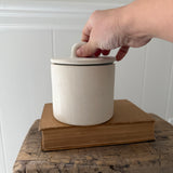 Handmade small stoneware canister with a fitted lid for spices, tea, or coffee
