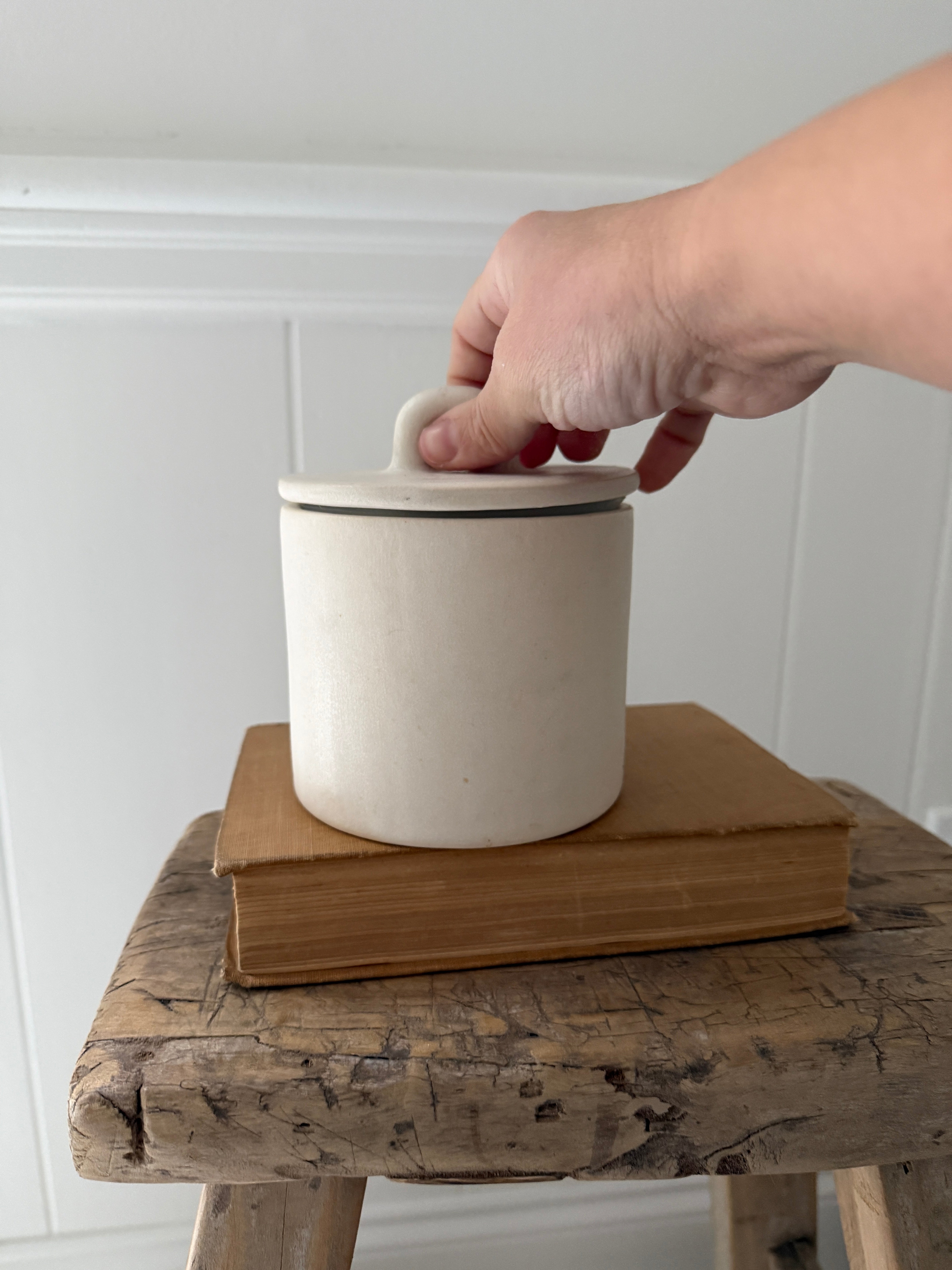 Handmade small stoneware canister with a fitted lid for spices, tea, or coffee