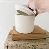 Handmade small stoneware canister with a fitted lid for spices, tea, or coffee
