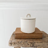 Handmade small stoneware canister with a fitted lid for spices, tea, or coffee