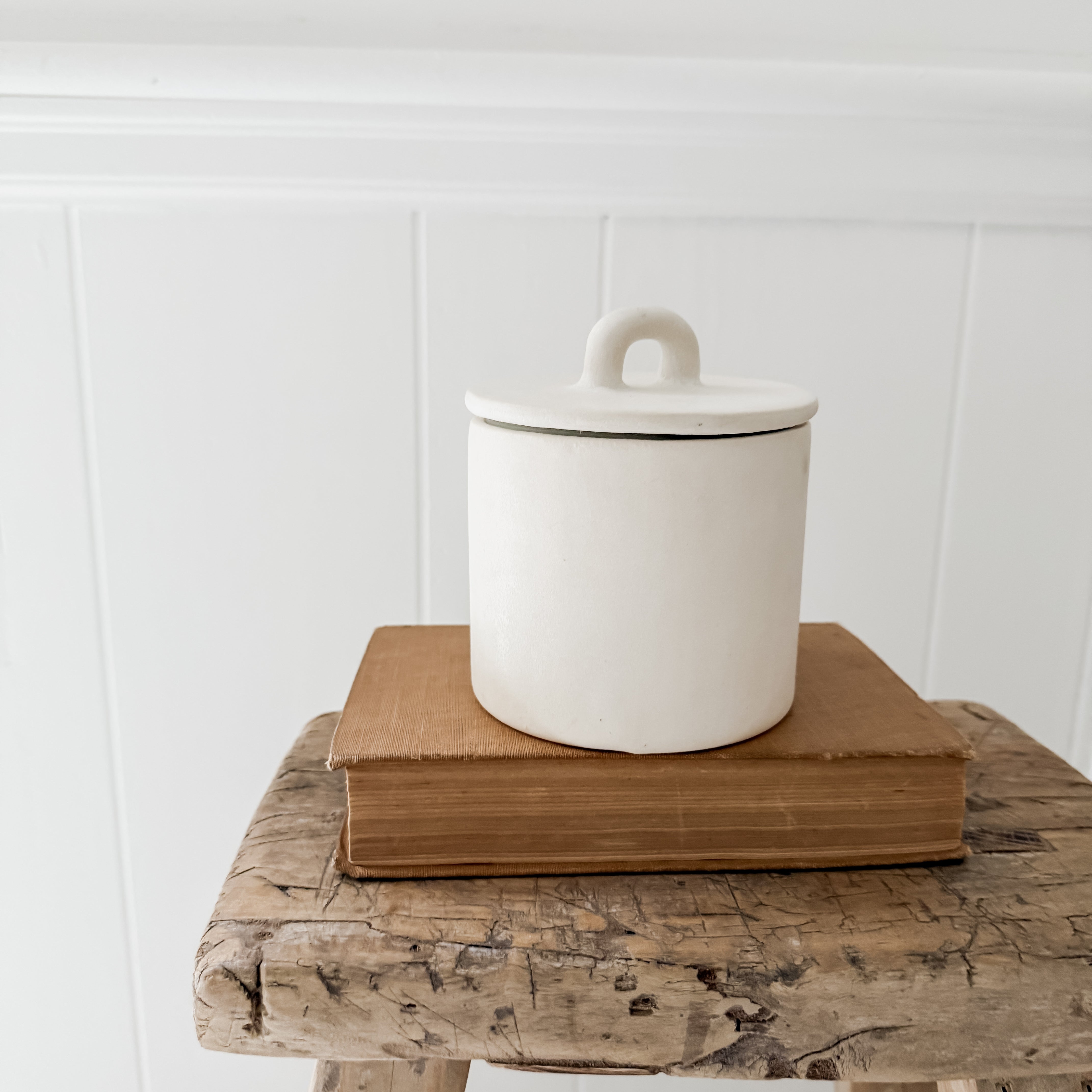 Handmade small stoneware canister with a fitted lid for spices, tea, or coffee