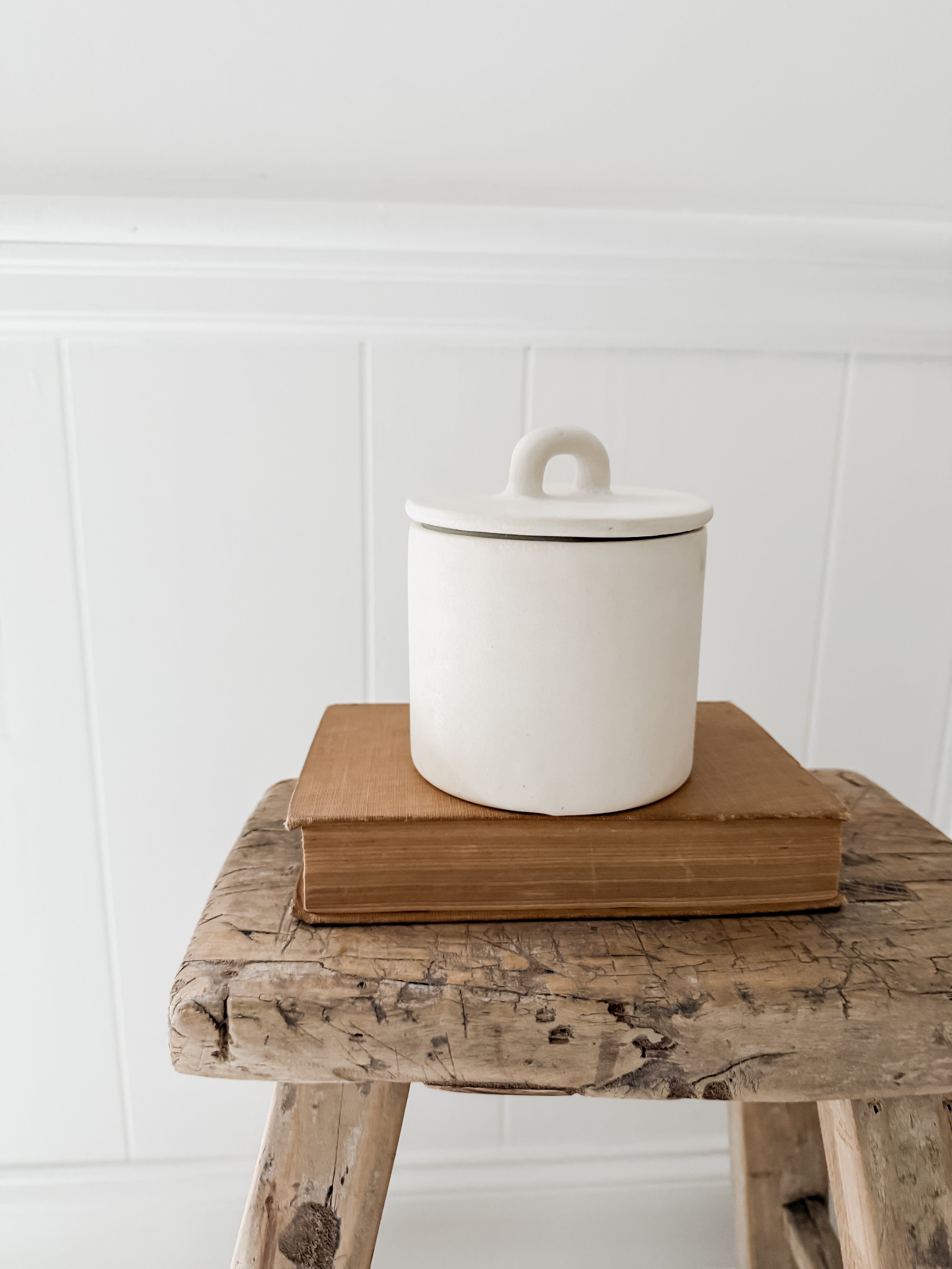 Handmade small stoneware canister with a fitted lid for spices, tea, or coffee