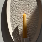 Handmade oval ceramic taper candle wall sconce, textured interior detail