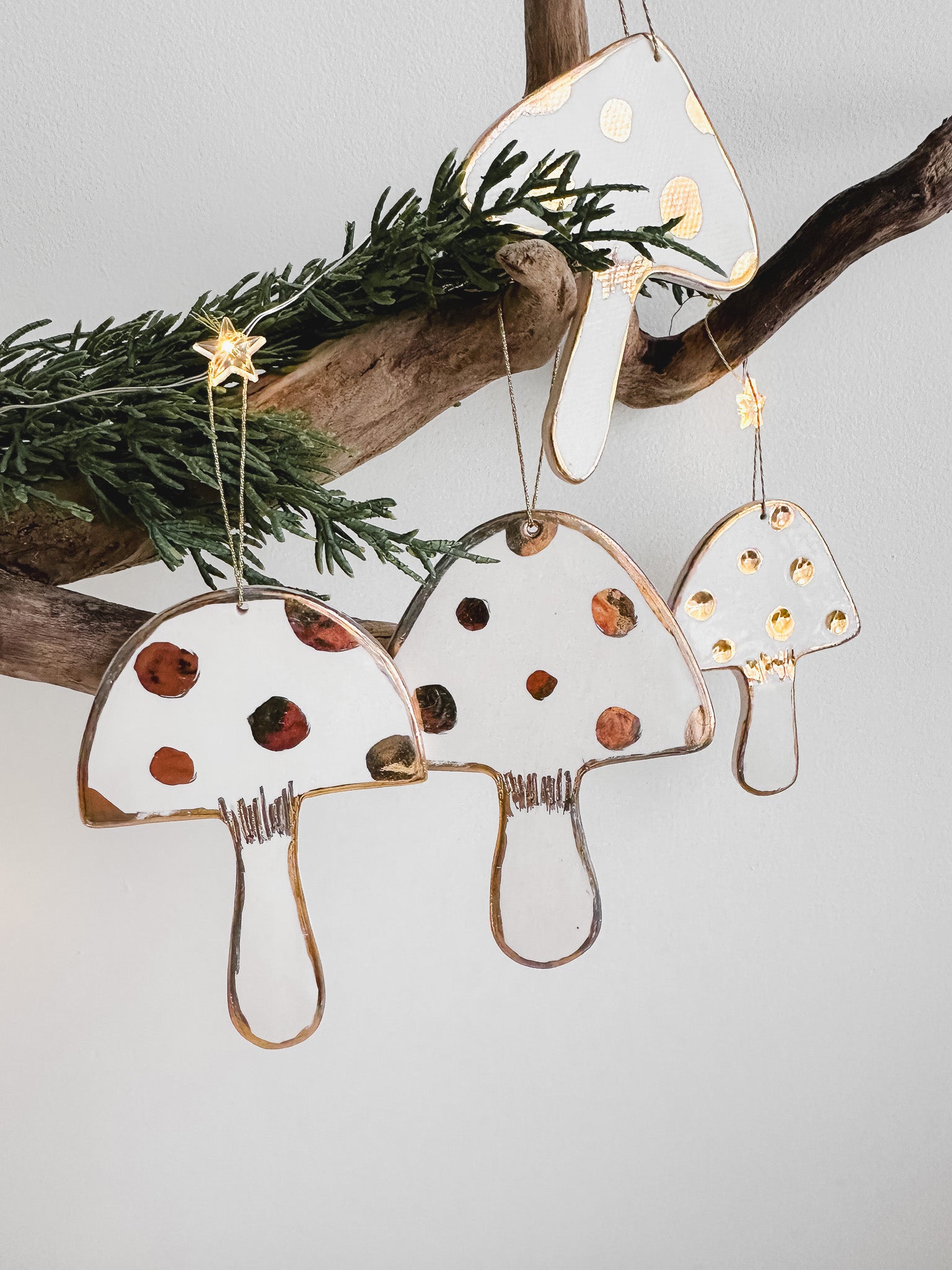 Handmade porcelain mushroom ornaments with 22K gold luster by Muddy Heart