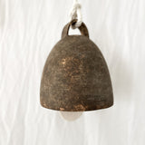 Large campana ceramic bell shown for scale