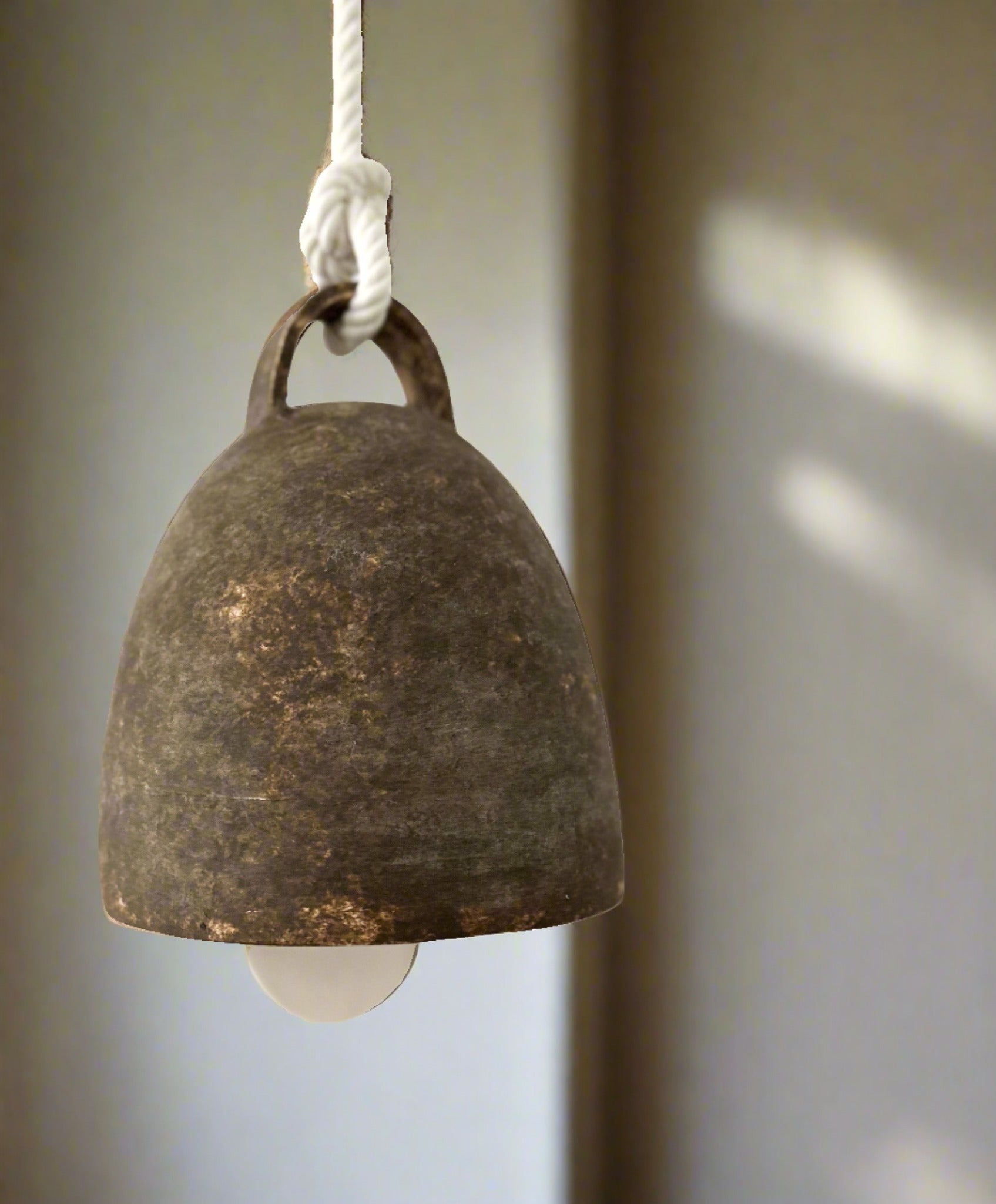 Large handmade ceramic campana bell in a neutral glaze