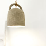 Handmade ceramic barrel pendant light, close-up view