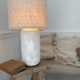 Handmade ceramic Paxton table lamp with a rustic cylindrical base