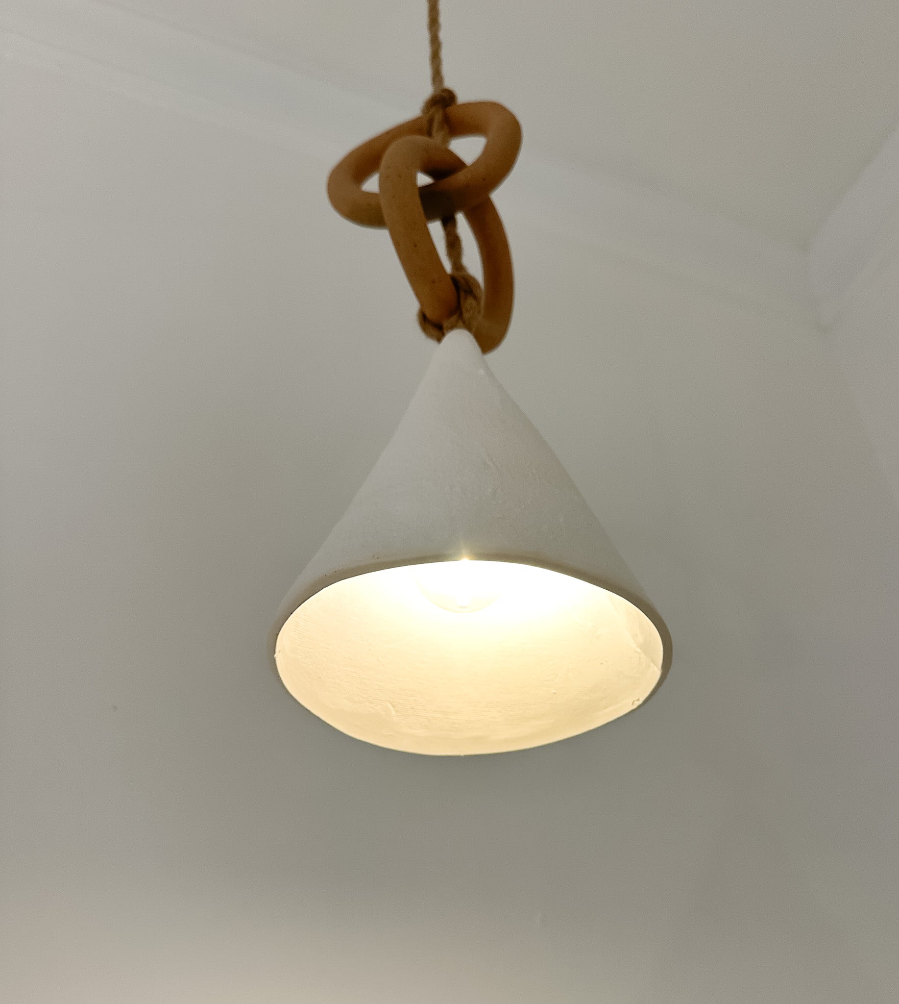Ceramic loops pendant light, detail of the looped form