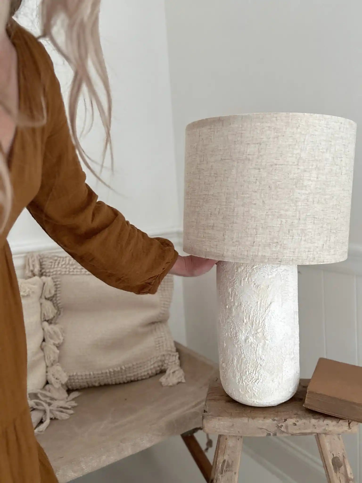 Sculptural rounded ceramic table lamp in a neutral glaze