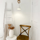 Neutral-glaze ceramic loops pendant lamp shown lit