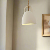 Handmade ceramic open-bell pendant light in a neutral glaze