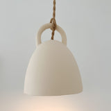 Neutral-glaze ceramic open-bell pendant lamp, close-up of the finish