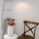 Handmade ceramic pendant light with an open bell silhouette, detail view