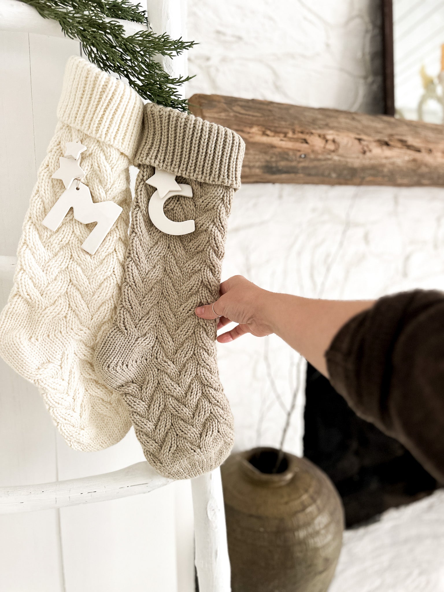 Handmade knit stocking in taupe with a personalized ceramic initial
