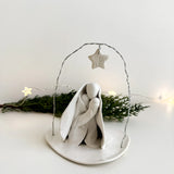 Pared-back ceramic nativity figures in a neutral glaze