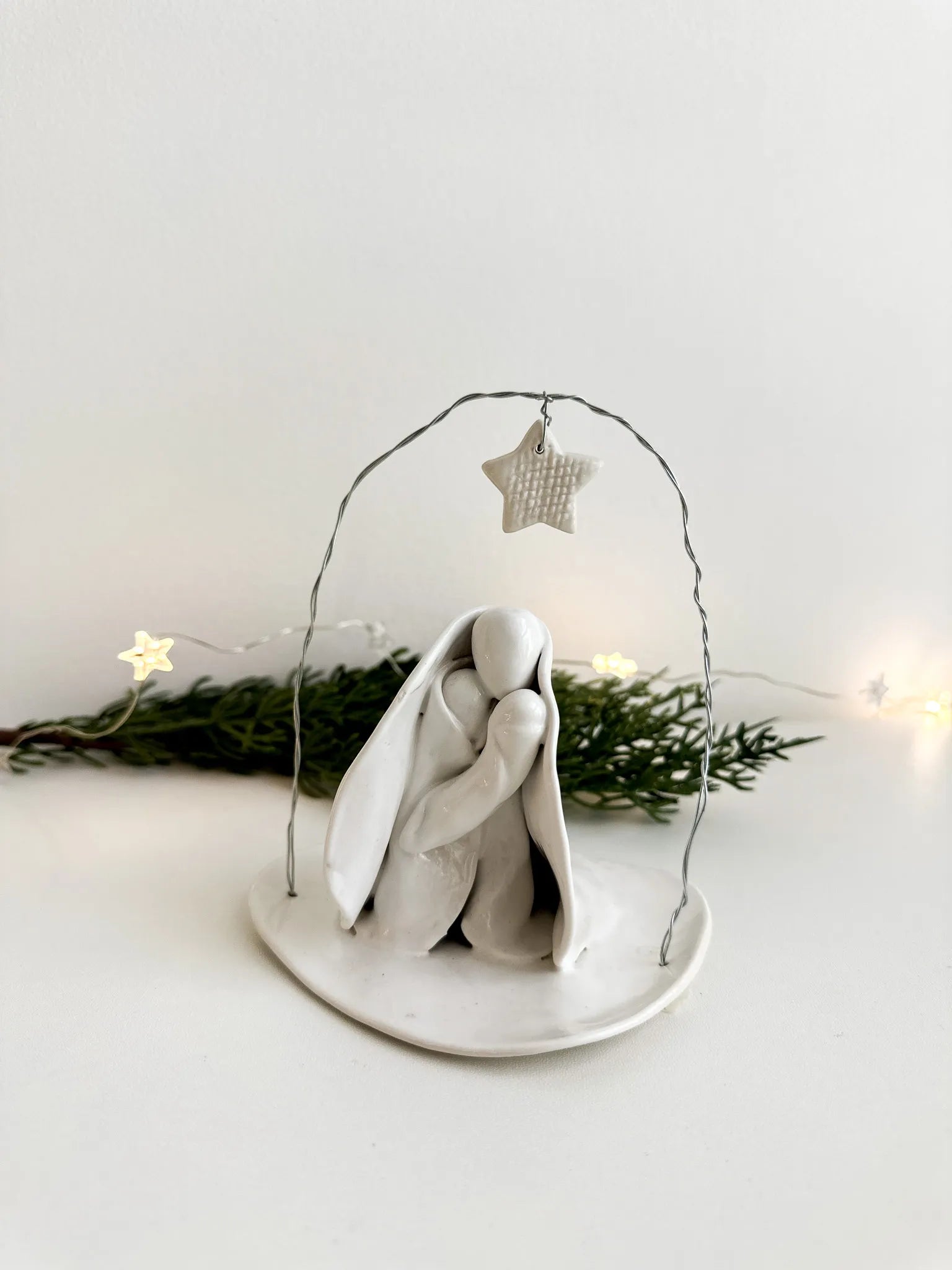 Pared-back ceramic nativity figures in a neutral glaze