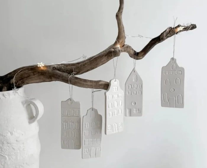 Scandinavian-inspired porcelain house ornaments in white