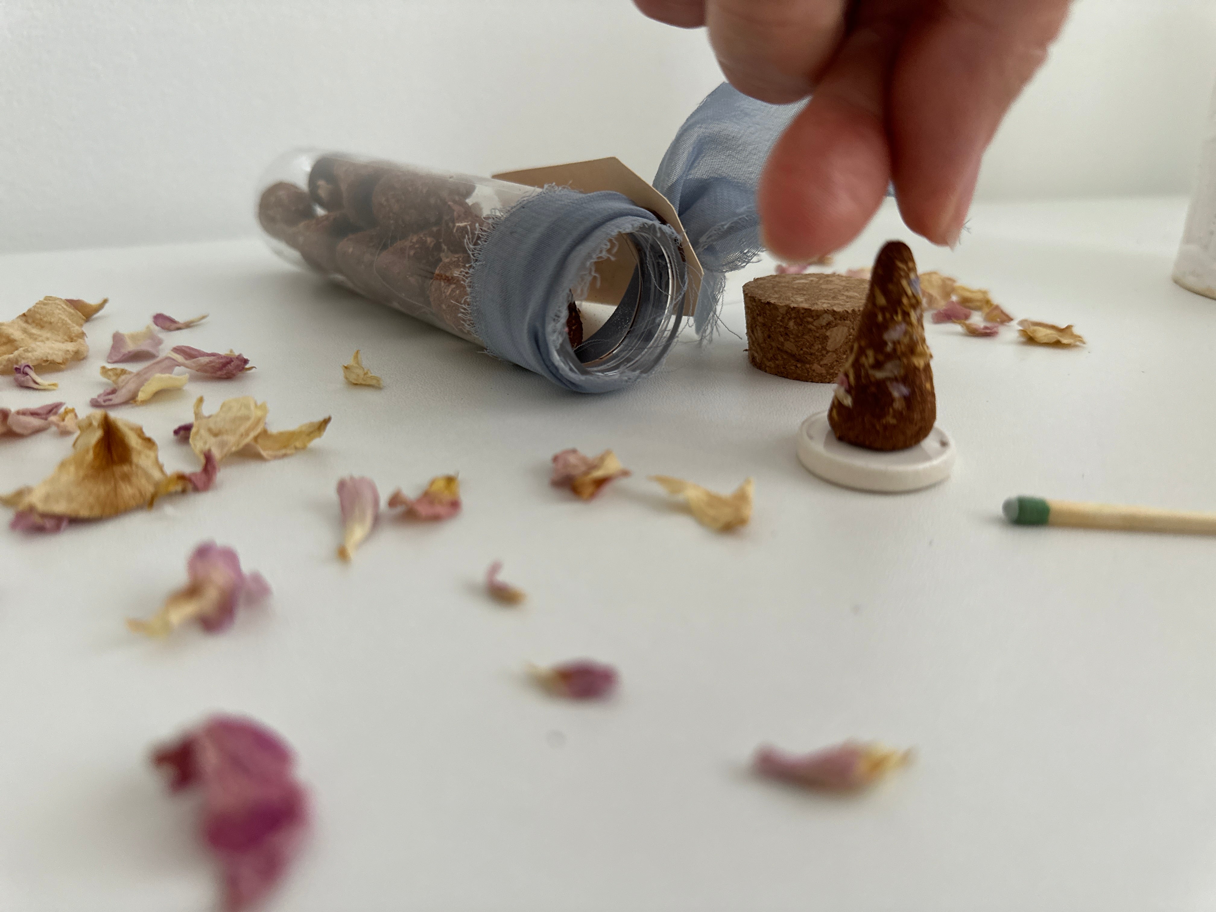 Natural incense cones and burner disc styled together