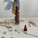 A handful of natural hand-rolled incense cones
