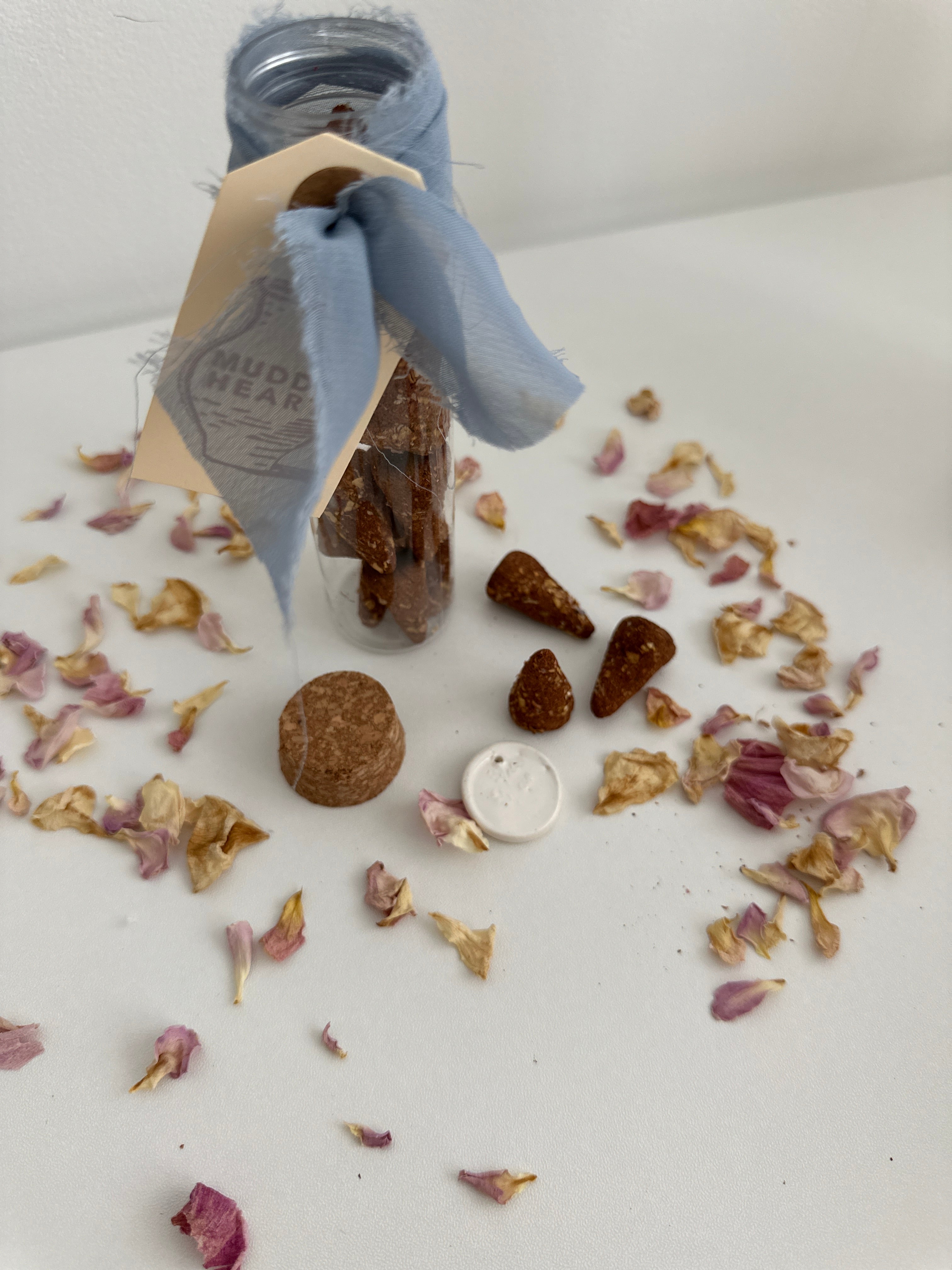 Set of natural incense cones with a glass scent vial
