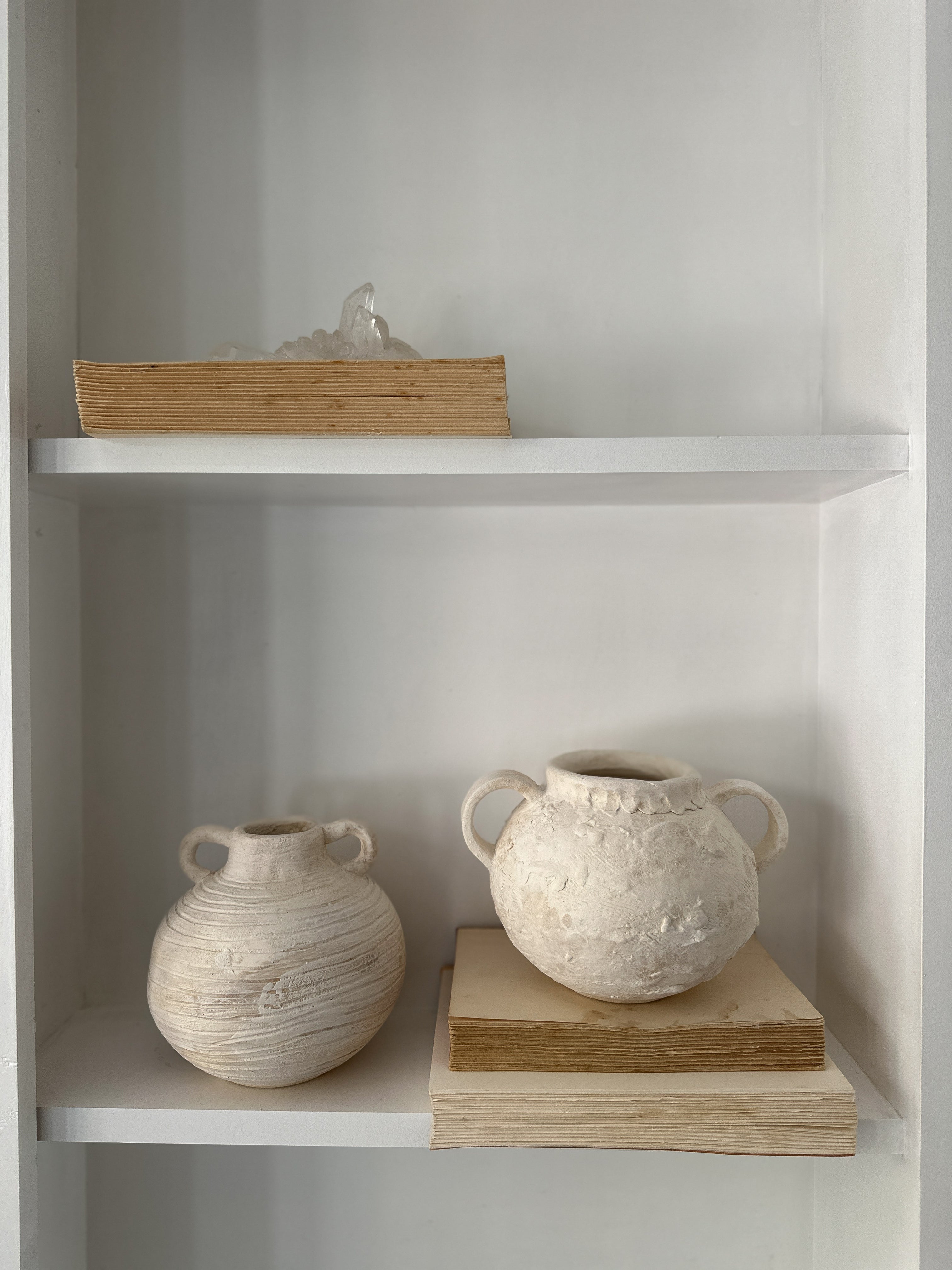 Handmade wide banded stoneware vessel with a raw clay exterior