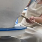 Ancient-inspired ceramic art vessel with an earthy glaze
