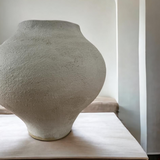 Sculptural ceramic art vessel for indoor or covered outdoor display