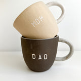 Personalized Mom & Dad ceramic mugs with clean lettering