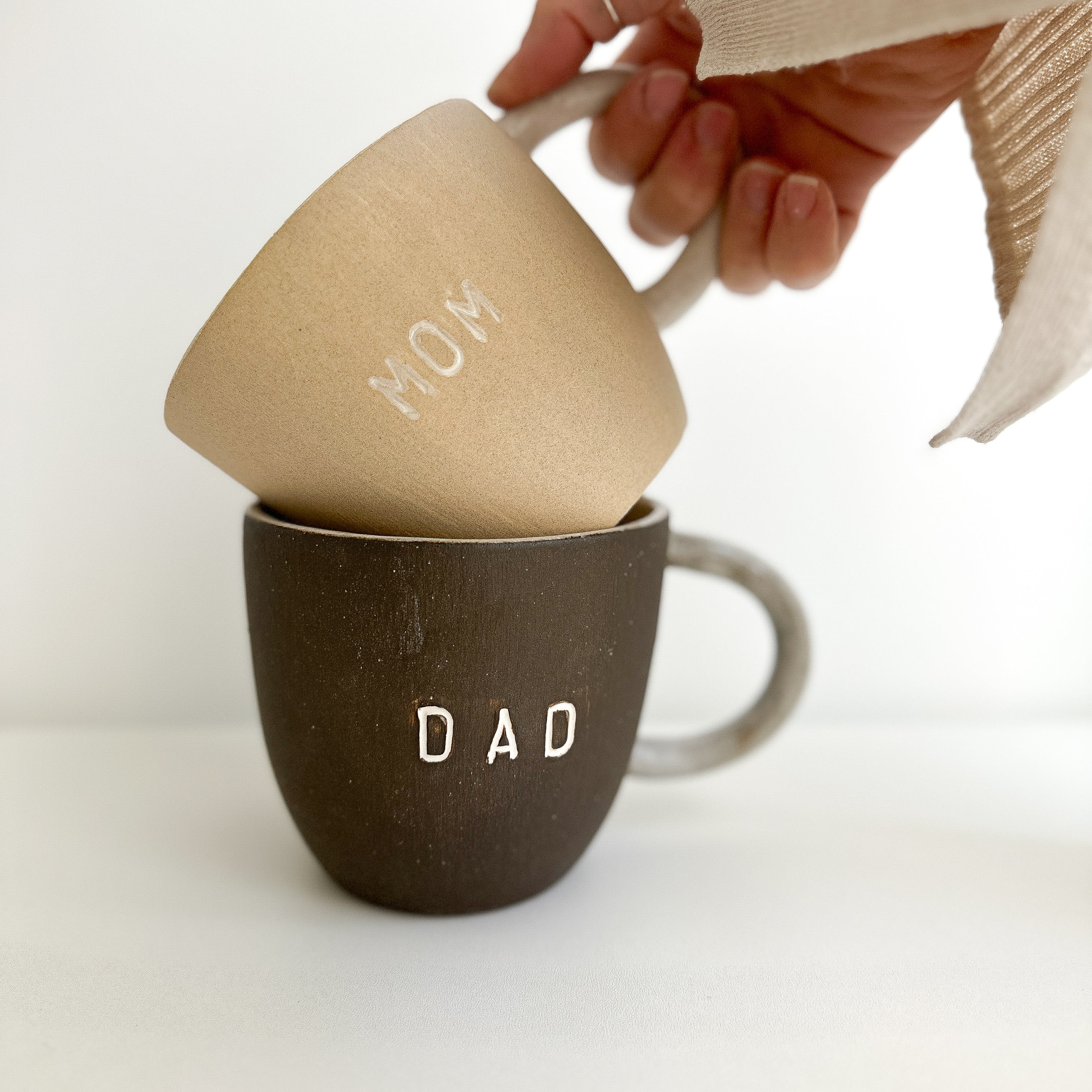 Handmade ceramic Mom and Dad mug pair in a neutral glaze