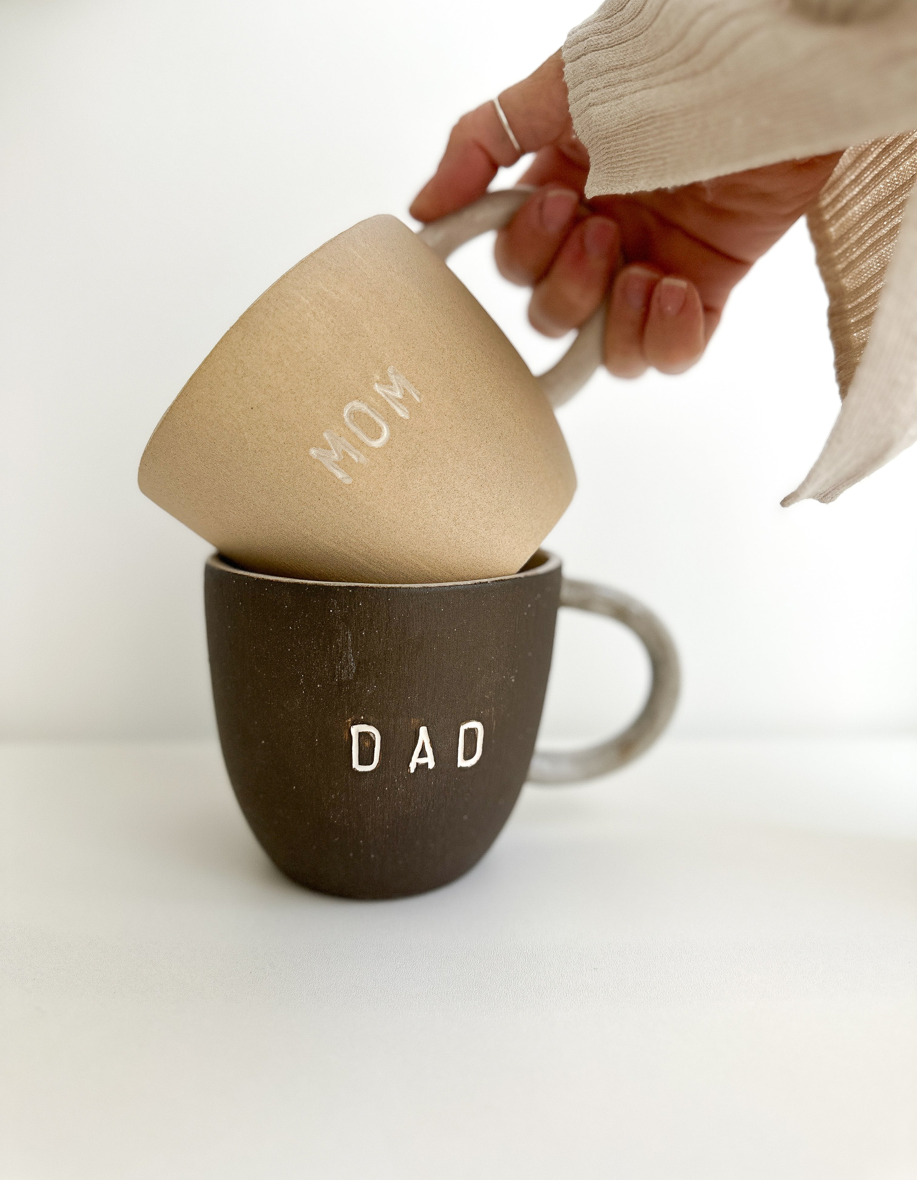 Handmade ceramic Mom and Dad mug pair in a neutral glaze