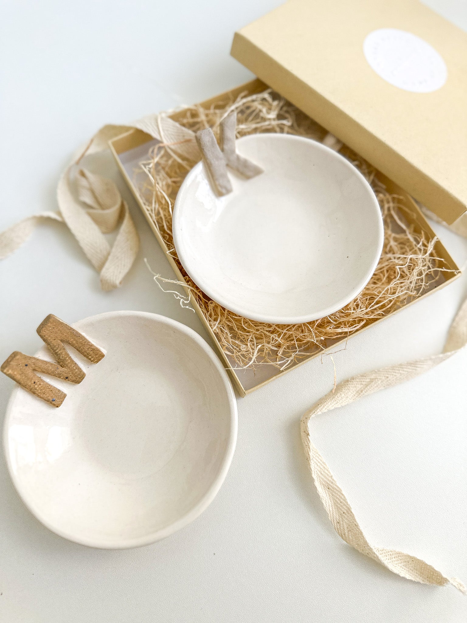 Handmade ceramic ring and jewelry dish personalized with a gold initial