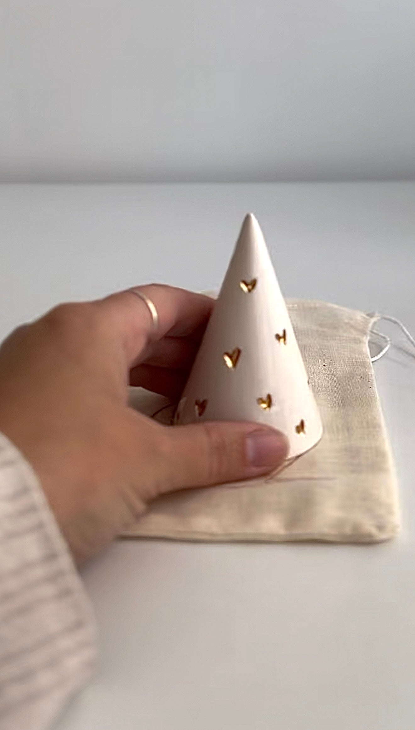 Handmade ceramic ring cone carved with little hearts and gilded in real 22-karat gold