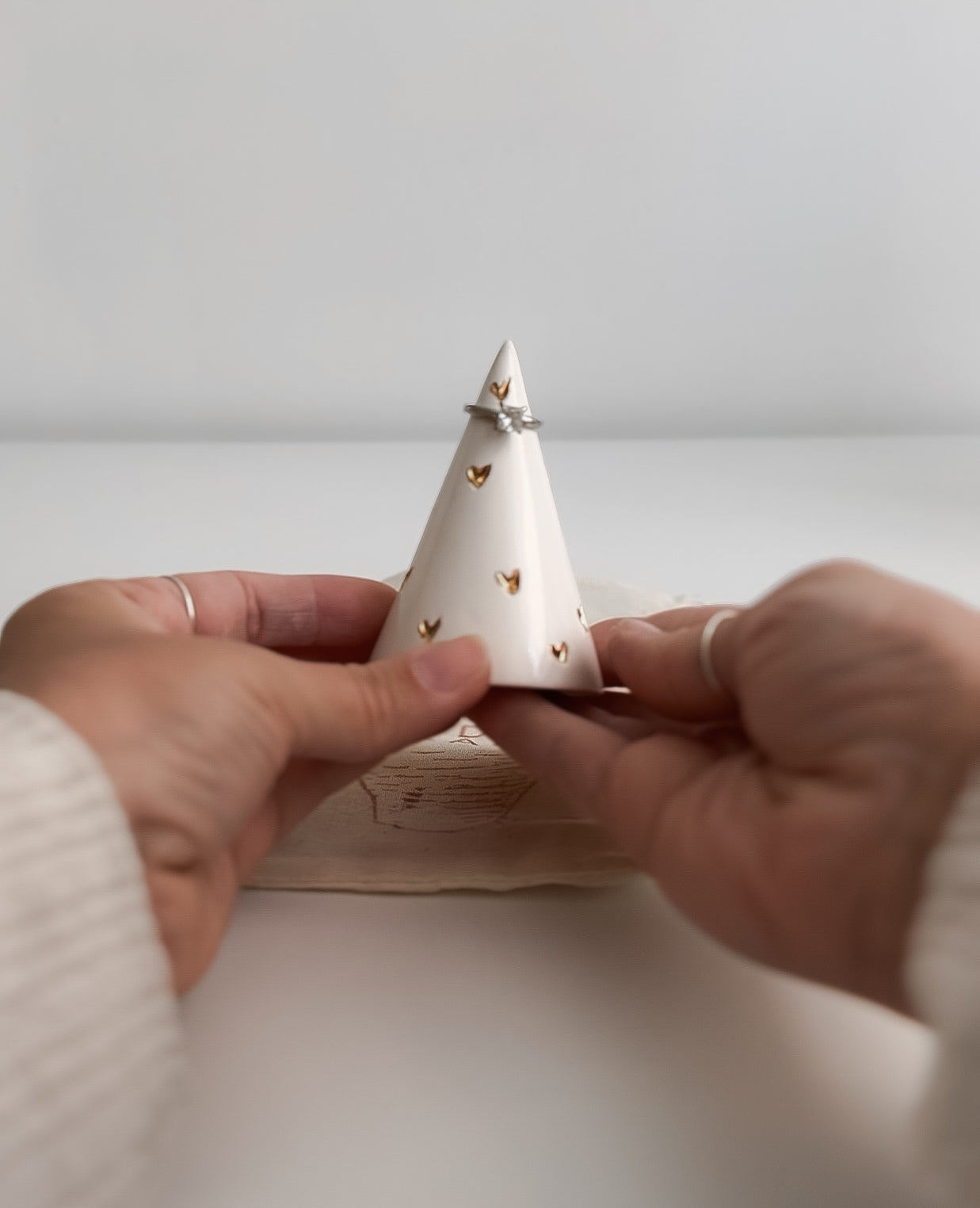 Handmade ceramic ring cone carved with little hearts and gilded in real 22-karat gold