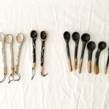 Hand-carved ceramic serving spoon in a moody dark glaze, seconds sale