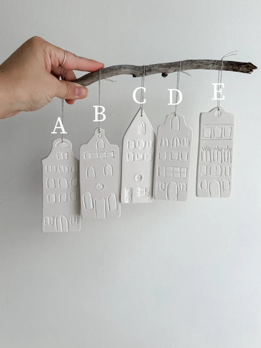 Delicate porcelain canal house ornament with architectural detail