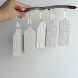 Delicate porcelain canal house ornament with architectural detail