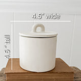Handmade small stoneware canister with a fitted lid for spices, tea, or coffee
