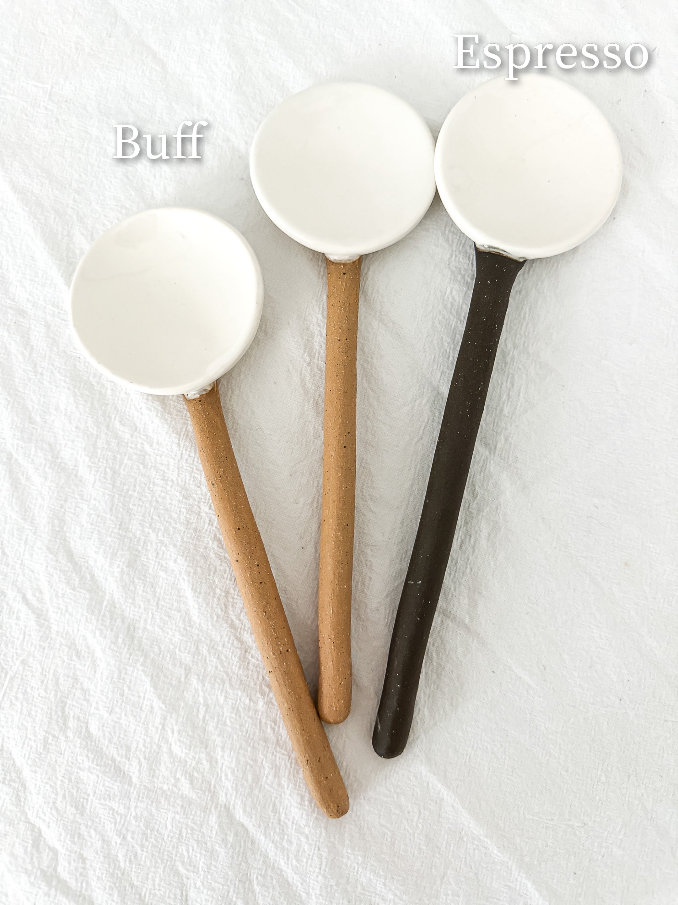 Handmade ceramic coffee and spice spoons in buff and espresso glazes, seconds-sale pieces from Muddy Heart
