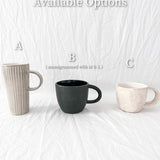 Assorted handmade ceramic mugs with textured glazes, dishwasher-safe seconds-sale pieces from Muddy Heart