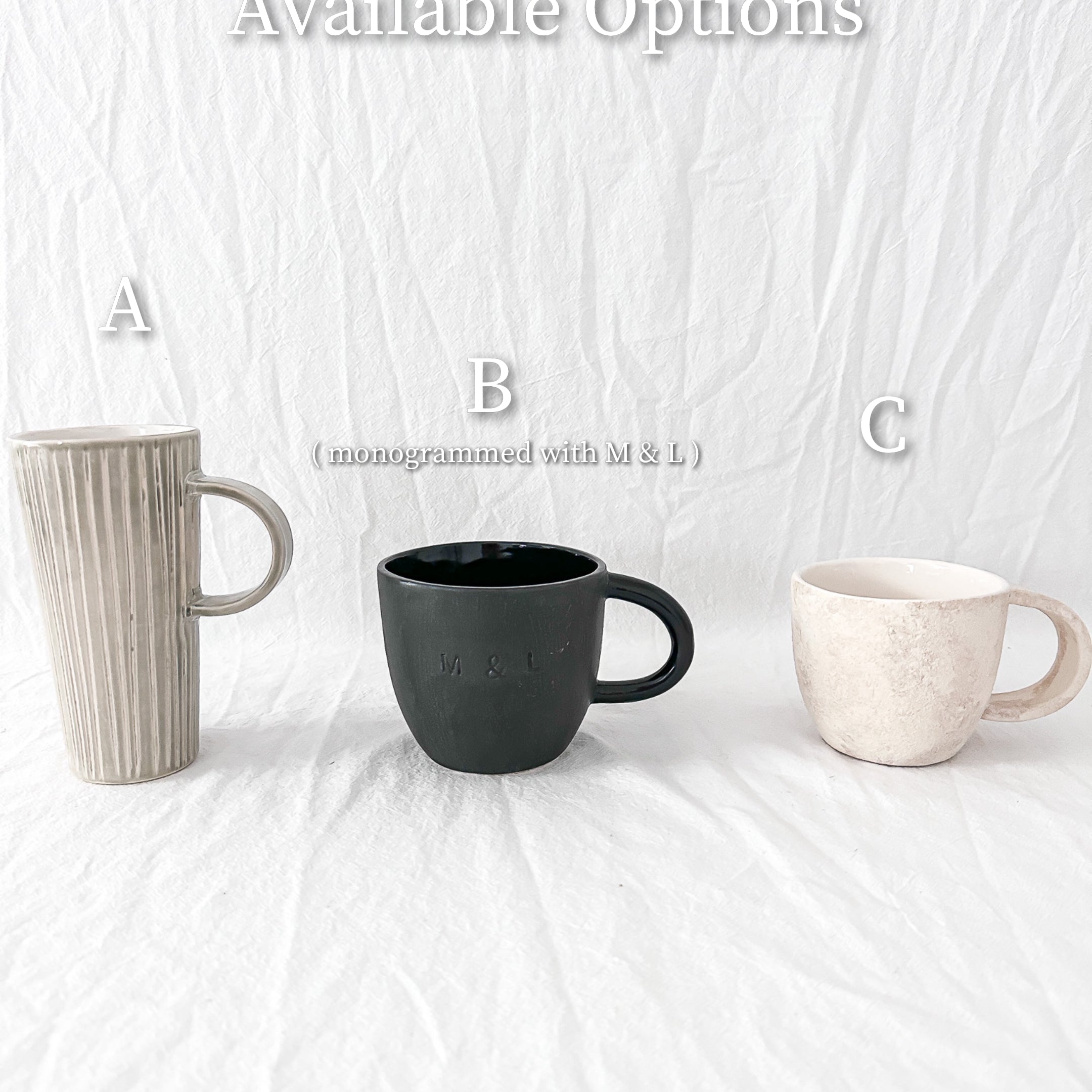 Assorted handmade ceramic mugs with textured glazes, dishwasher-safe seconds-sale pieces from Muddy Heart