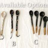 Artisan ceramic spoon with a deep glaze tone, discontinued design