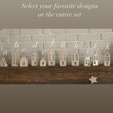 Handmade ceramic tea light houses inspired by Amsterdam canal homes