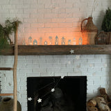 Handmade ceramic tea light houses inspired by Amsterdam canal homes