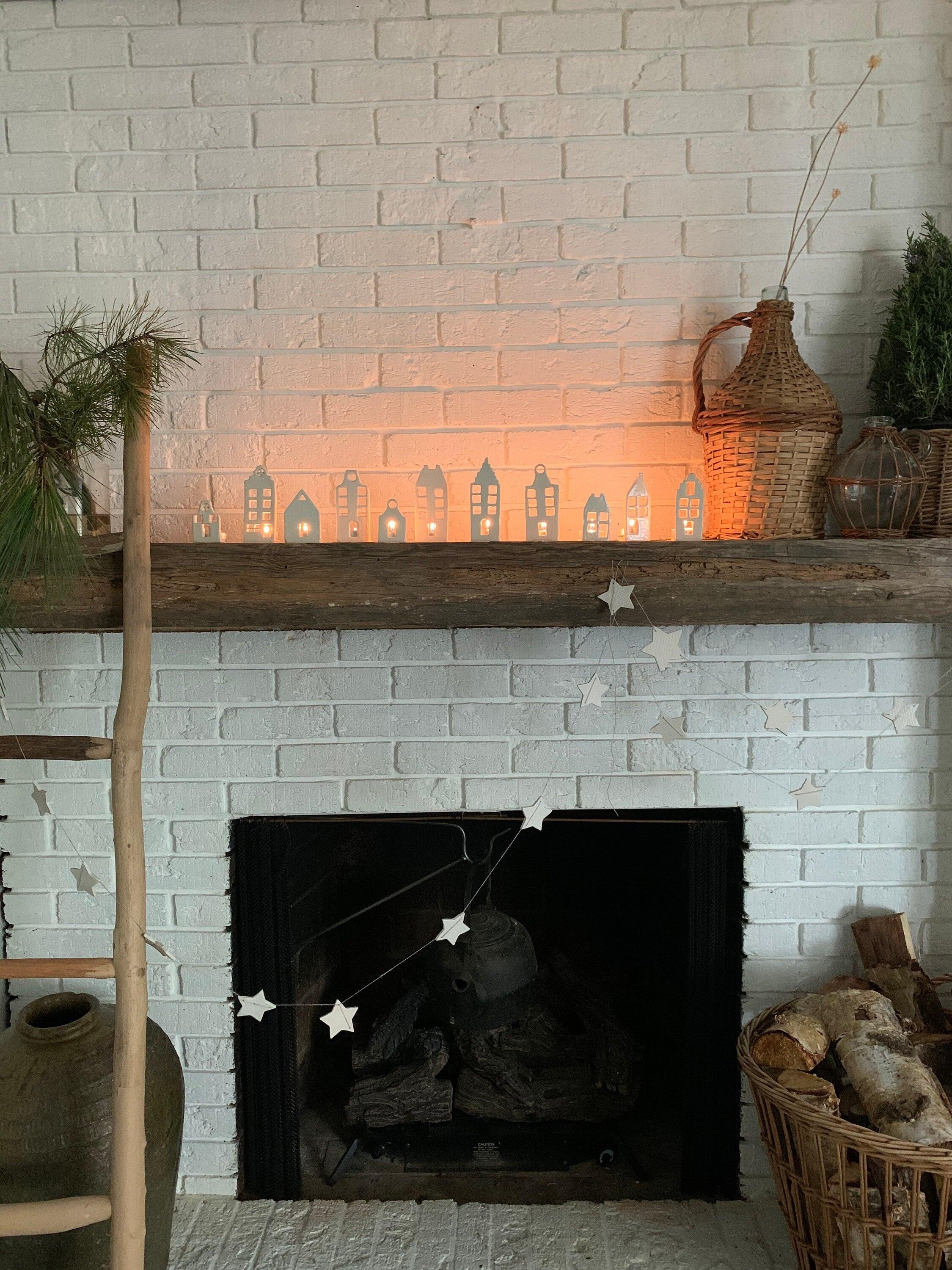 Handmade ceramic tea light houses inspired by Amsterdam canal homes
