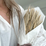Bundle of 100 natural dried wheat stems in golden tones with soft sage undertones, 16 inches long, for autumn vase and mantel decor