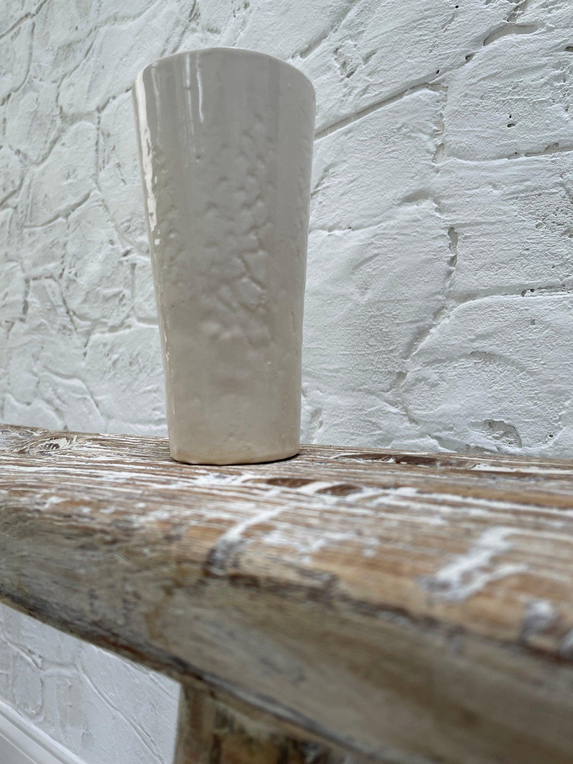 Handmade ceramic tumbler with antique lace texture