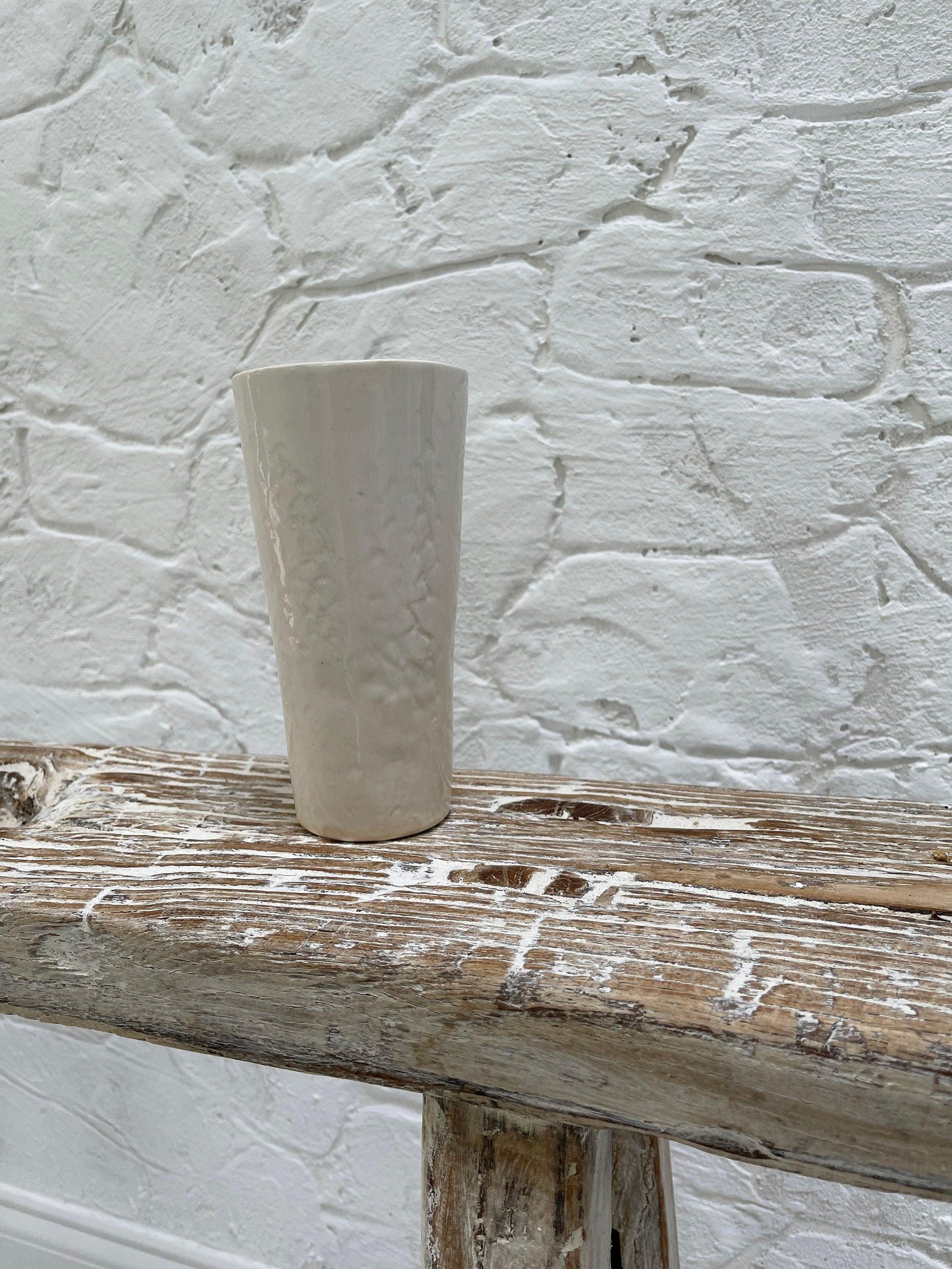 Handmade ceramic tumbler with antique lace texture