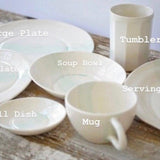 Handmade rustic speckled stoneware dinnerware with white glazed interior by Muddy Heart
