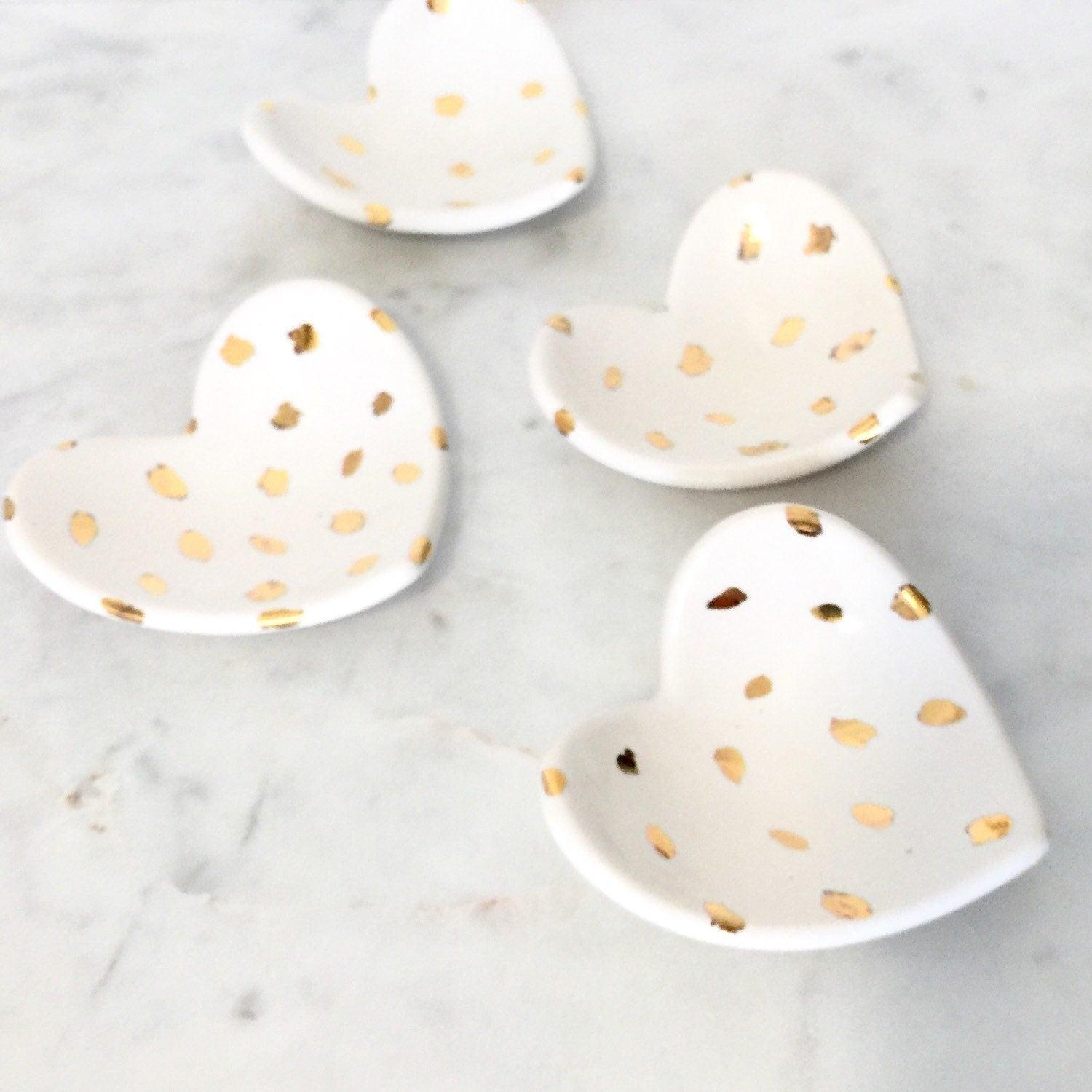 Unique heart-shaped ceramic dishes with 22k gold dot design for minimalist decor